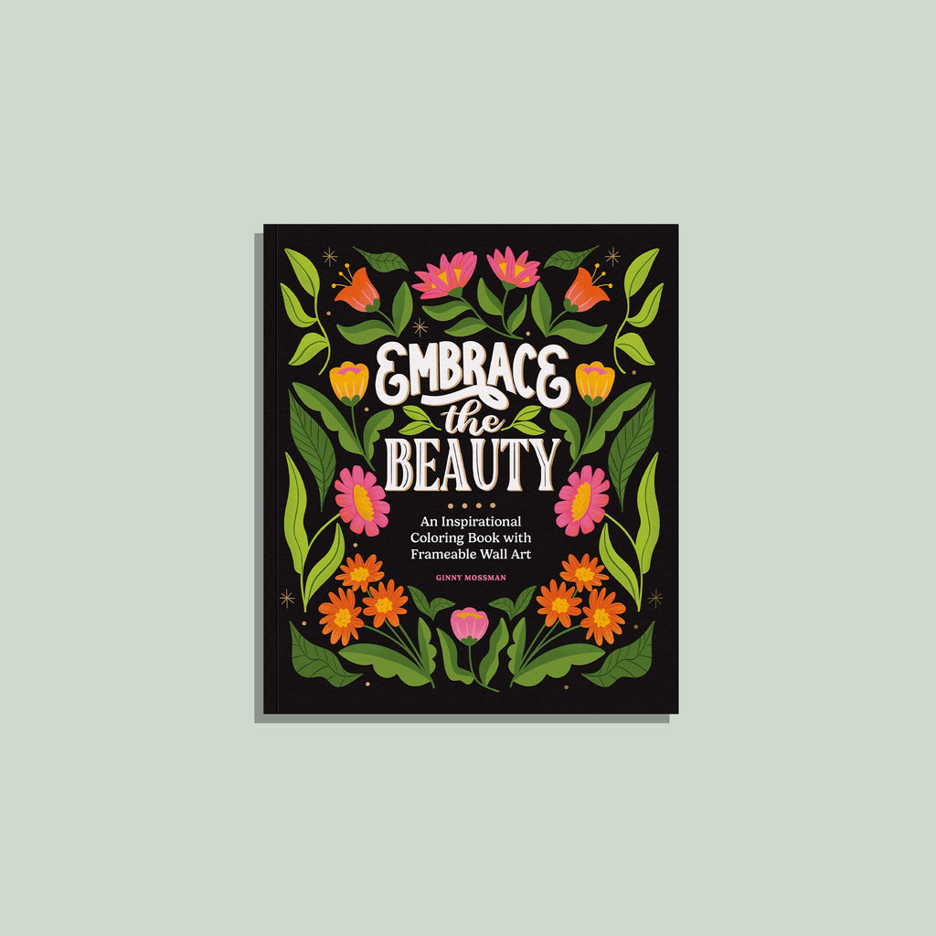 Decorative book cover with floral design and text on a light gray background. Reads Embrace the Beauty. An inspirational coloring book with female wall art by Ginny mossman  