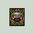 Decorative book cover with floral design and text on a light gray background. Reads Embrace the Beauty. An inspirational coloring book with female wall art by Ginny mossman  